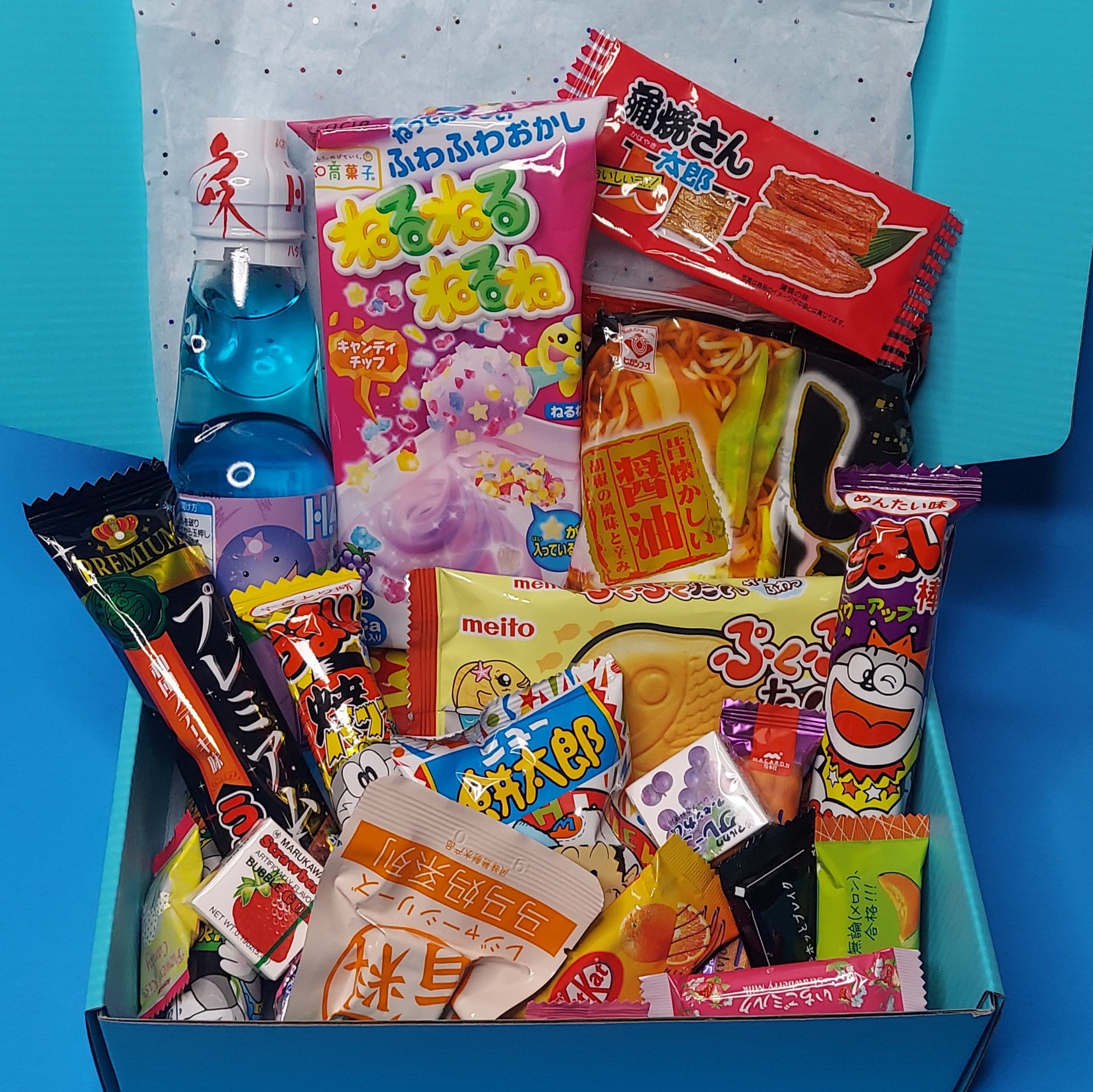 Japanese snack box with drink -  Italia